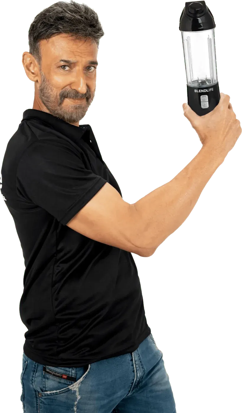 BlendLife BLAZE portable blender held by Rahul Dev